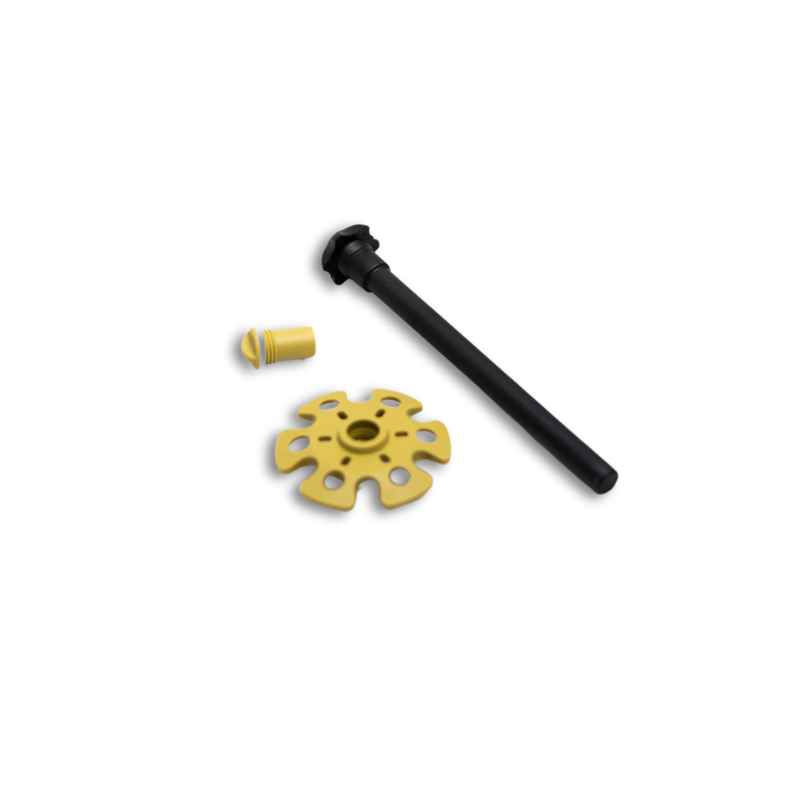 Accessoires inclus avec les bâtons Lacal : réservoir noir pour génépi, bouchon jaune faisant office de verre doseur, et rondelle large pour ski hors-piste.